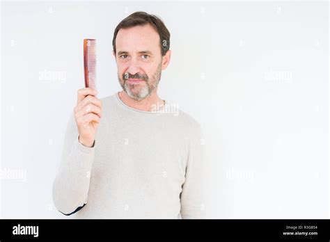 Portrait Mature Man Combing Hair Hi Res Stock Photography And Images