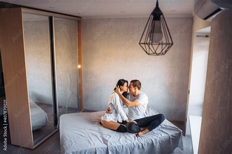 Beautiful Passionate Couple Having Sex On The Bed Cheerful Romantic Lovers Hugging The