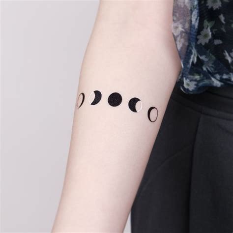 Phases Of The Moon Wrist Tattoo