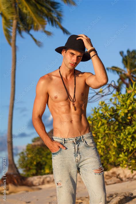 Handsome Mature Male Model Walking Alone On The Beach Thinking While