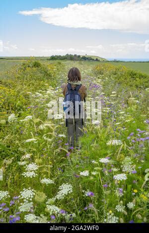 Rear View Of Half Naked Woman Standing Behind An Old Door Stock Photo Alamy