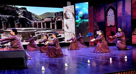 Artists performing dance during Culture Exhibition on Gandhara ...