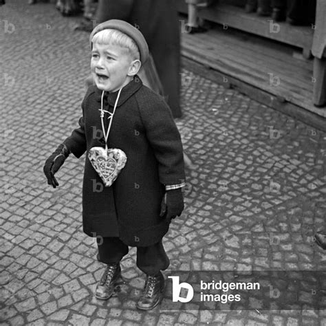 Image Of A Little Boy Bitterly Crying Becuase He Lost His Parents