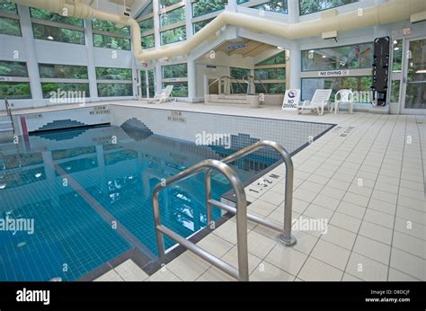 Public indoor wave swimming pool Stock Photo - Alamy