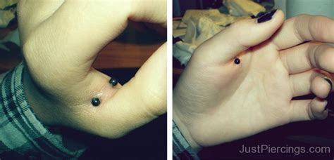 Hand Web Piercing With Black Barbell