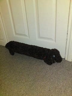 Knitted Dog Draught Excluder pattern by Hobbycraft | Pattern, Free ...