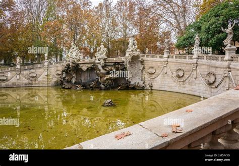 The Monumental Fountain Of Twelve Months Surrounded By Trees In