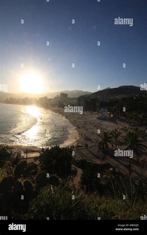 Rio de Janeiro sunset and beach in Brazil Stock Photo - Alamy