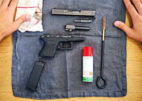 Tools Essential for Every Gun Owner. a Shot of a Disassembled Gun Lying ...