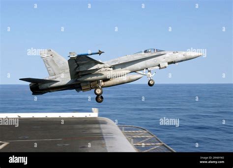 US Navy An F A 18C Launches From One Of Four Steam Powered Catapults On