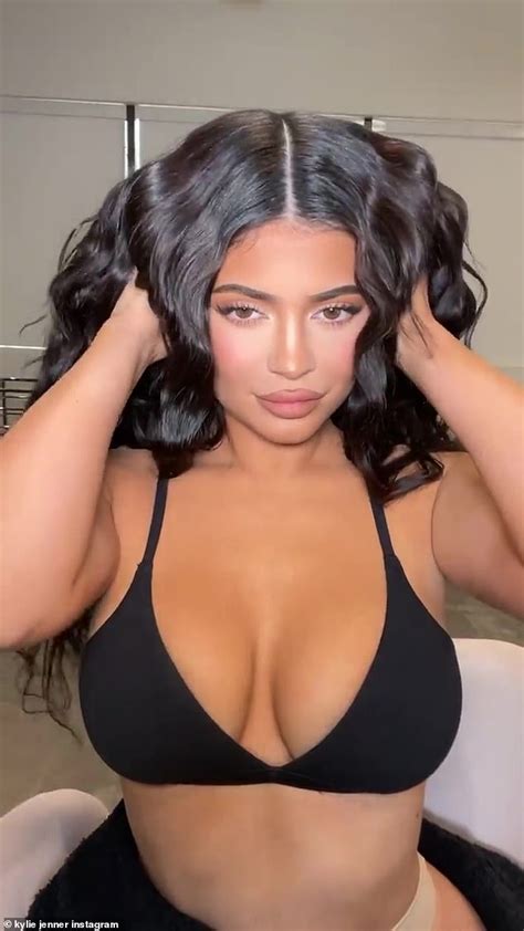 Kylie Jenner Shows Off Her Cleavage In A Bikini Top While Getting Her Hair Styled Daily Mail