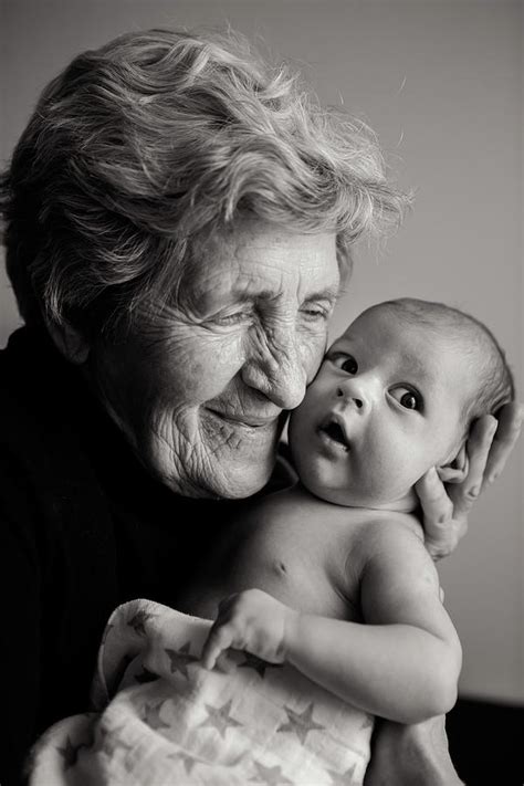 Great Grandmother Holds The Hands Of His Beloved Grandson Photograph By