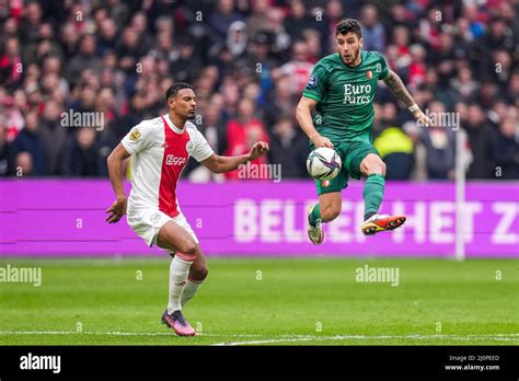 Amsterdam Sebastien Haller Of Ajax Marcos Senesi Of Feyenoord During