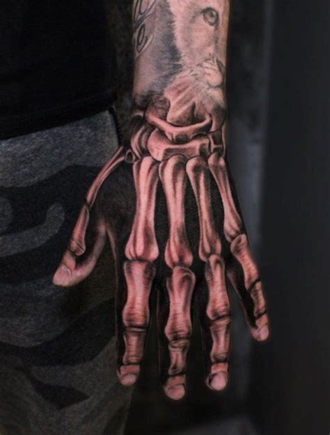 100 Fantastic Skeleton Hand Tattoos Cool And Unique The Trend Scout