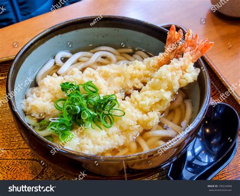 Japanese Noodle Called Udon With Deep Fried Shrimp Or Tempura Stock