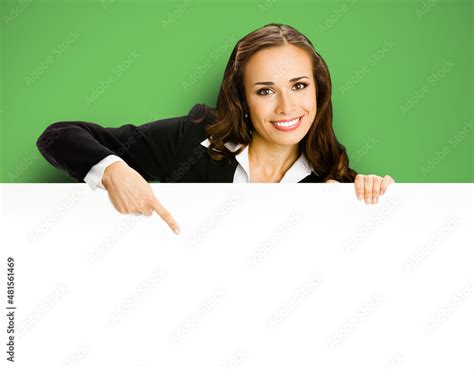 Cheerfully Smiling Brunette Business Woman In Blue Clothing Standing