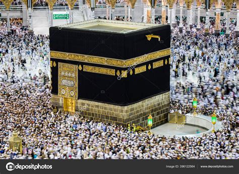 Holy Kaaba. Crowd of muslims walking around Kaaba for Tawaf during Hajj ...