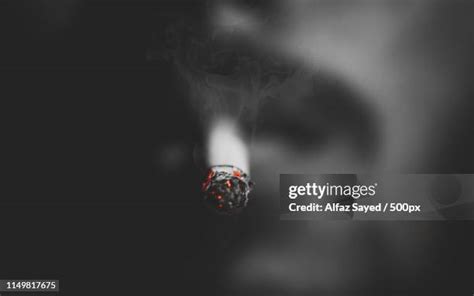 Male Smokers Photos And Premium High Res Pictures Getty Images