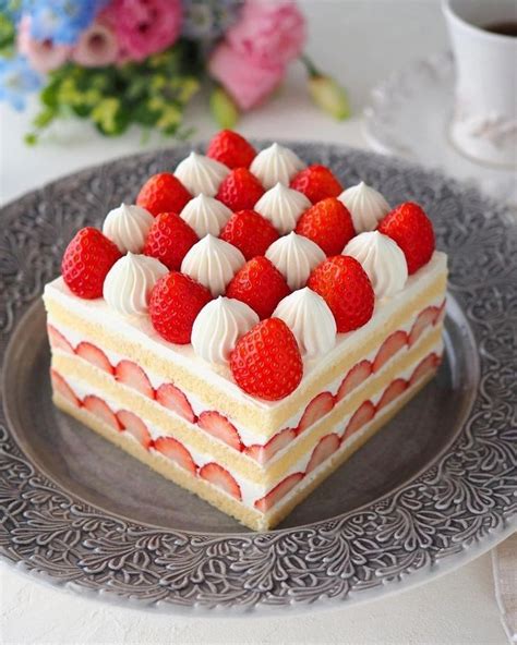 A Piece Of Cake With Strawberries On Top