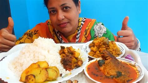 Eating Rice With Potato Fry Fish Oil Curry Fish Curry And Vegetable