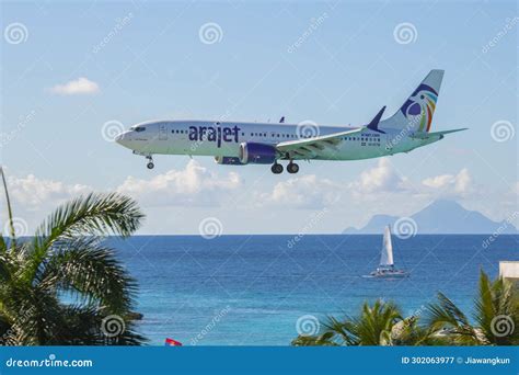 Airplane Flying Over Maho Beach Sint Maarten Dutch Caribbean