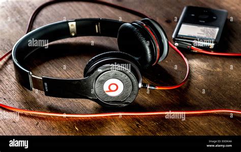 Beats Headphones By Dr Dre With Apple Ipod Stock Photo Alamy