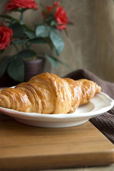 Golden Croissant on a White Plate Stock Image - Image of cafe, crescent ...