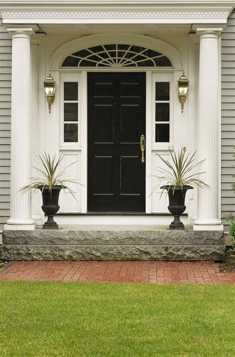 Charming Black Front Door With Siding And Sidelights