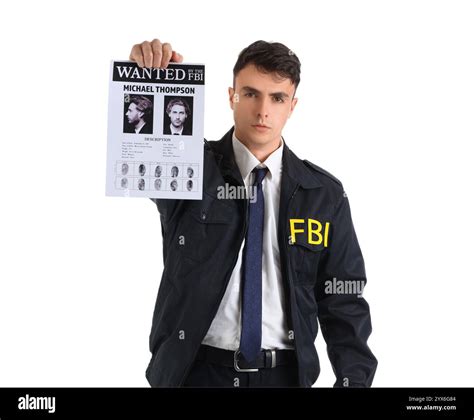 Male Fbi Agent With Wanted Poster On White Background Stock Photo Alamy