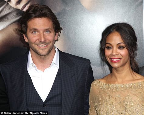 Zoe Saldana Digs Into Bag Of Crisps But Hides Them Behind Back When