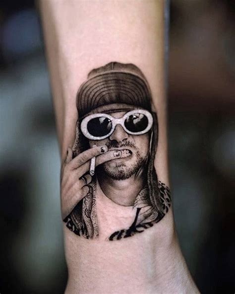 Micro Realistic Kurt Cobain Portrait Tattoo On The