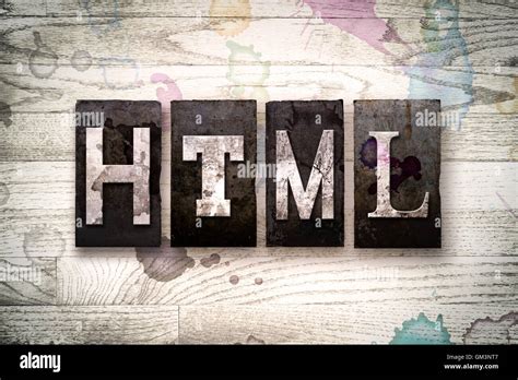 The Word HTML Written In Vintage Dirty Metal Letterpress Type On A