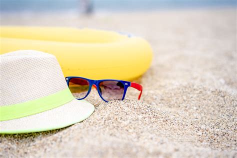 Brown Sun Hat on Beach · Free Stock Photo