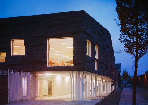 Le Roc Canteen By D Houndt Bajart Features A Craggy Facade