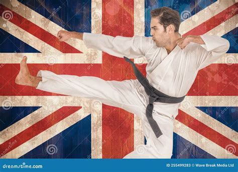 Martial Artist Kicking Against British Flag Stock Image Image Of