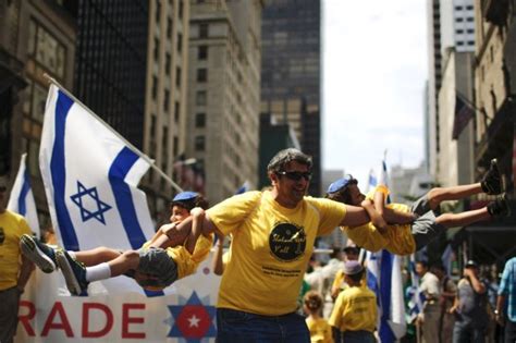 New Yorkers Dodge Raindrops Crowd Midtown For 51st Annual Celebrate Israel Parade New York