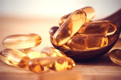 Premium Photo Close Up The Vitamin D And Omega 3 Fish Oil Capsules