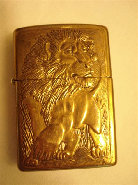 Vintage Zippo Lighter In Brass With Embossed Lion