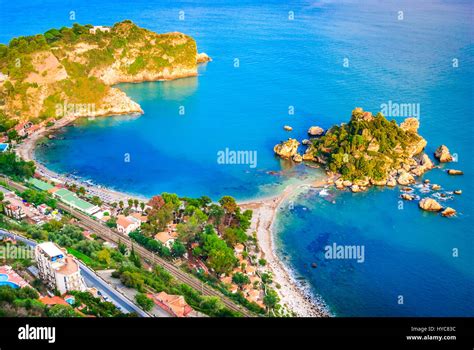 Taormina, Sicily. Sicilian seascape with beach and island Isola Bella ...