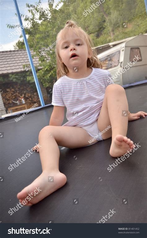 Baby Girl Jumping On Trampoline Stock Photo Shutterstock