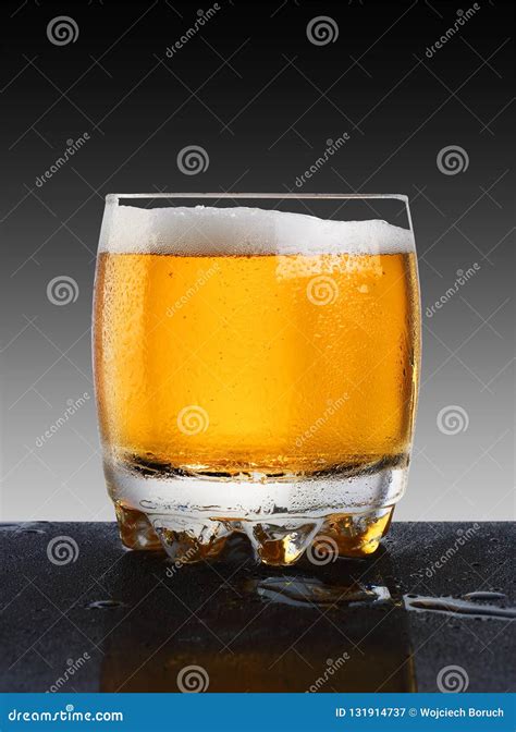 A Glass Of Beer With Drops Stock Image Image Of Glass 131914737