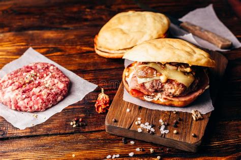 The Casanova Burger On Cutting Board Stock Photo Image Of Lunch