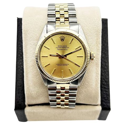 Rolex Oyster Perpetual 1005 Tiffany And Co 14K Yellow Gold Stainless