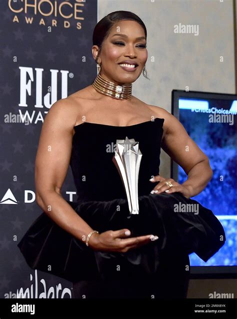 Angela Bassett Poses With The Award For Best Supporting Actress For