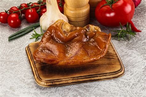 Premium Photo Smoked Pork Ear Snack Appetizer