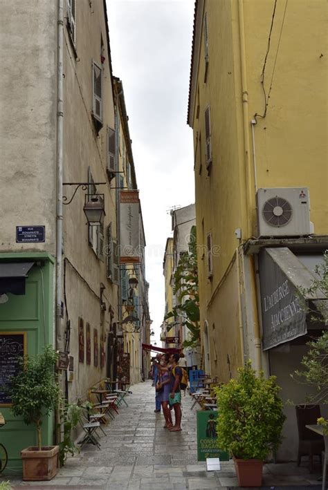 Tourists In Narrow Street In Front Of Maison Bonaparte Napoleon`s