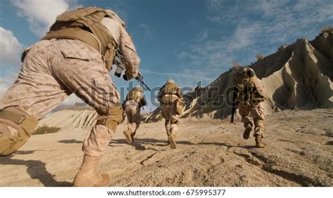 Closeup Shot Squad Soldiers Running Forward Stock Photo Edit Now