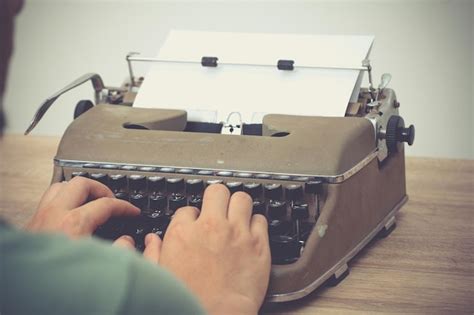 Premium Photo Close Up Of Person Typing On Old Typewriter