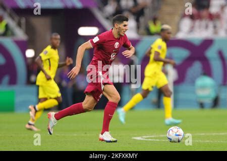 AL KHOR L R Karim Boudiaf Of Qatar Michael Estrada Of Ecuador