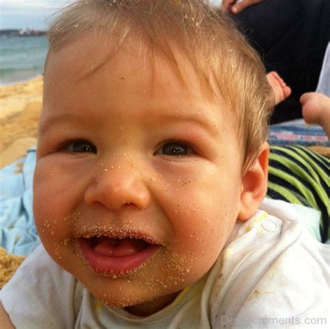 Baby Eating Sand - DesiComments.com